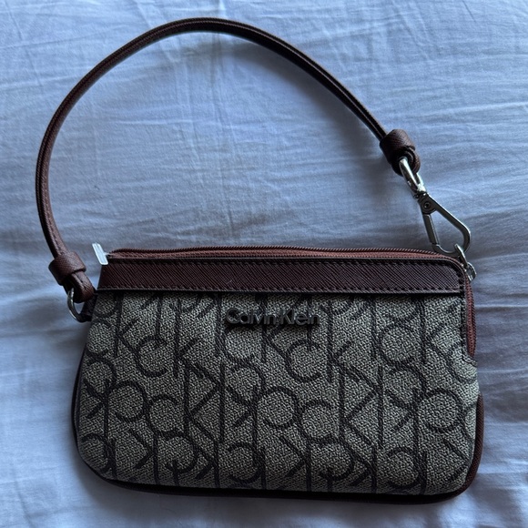 Calvin Klein Handbags - Calvin Klein Tan and Brown Monogram Wristlet